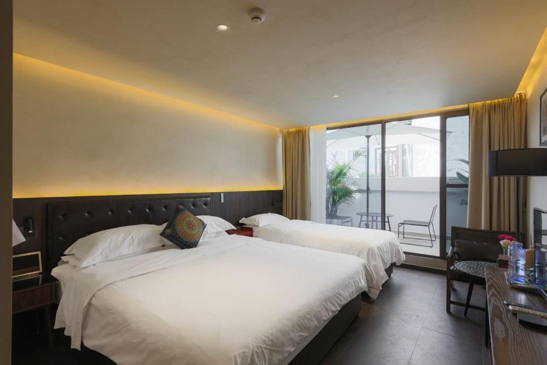 Qintai Tibetan Culture Boutique Hotel Чънду Екстериор снимка