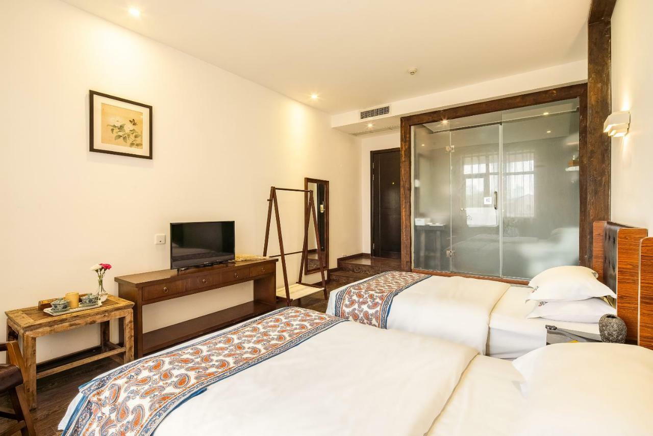 Qintai Tibetan Culture Boutique Hotel Чънду Екстериор снимка